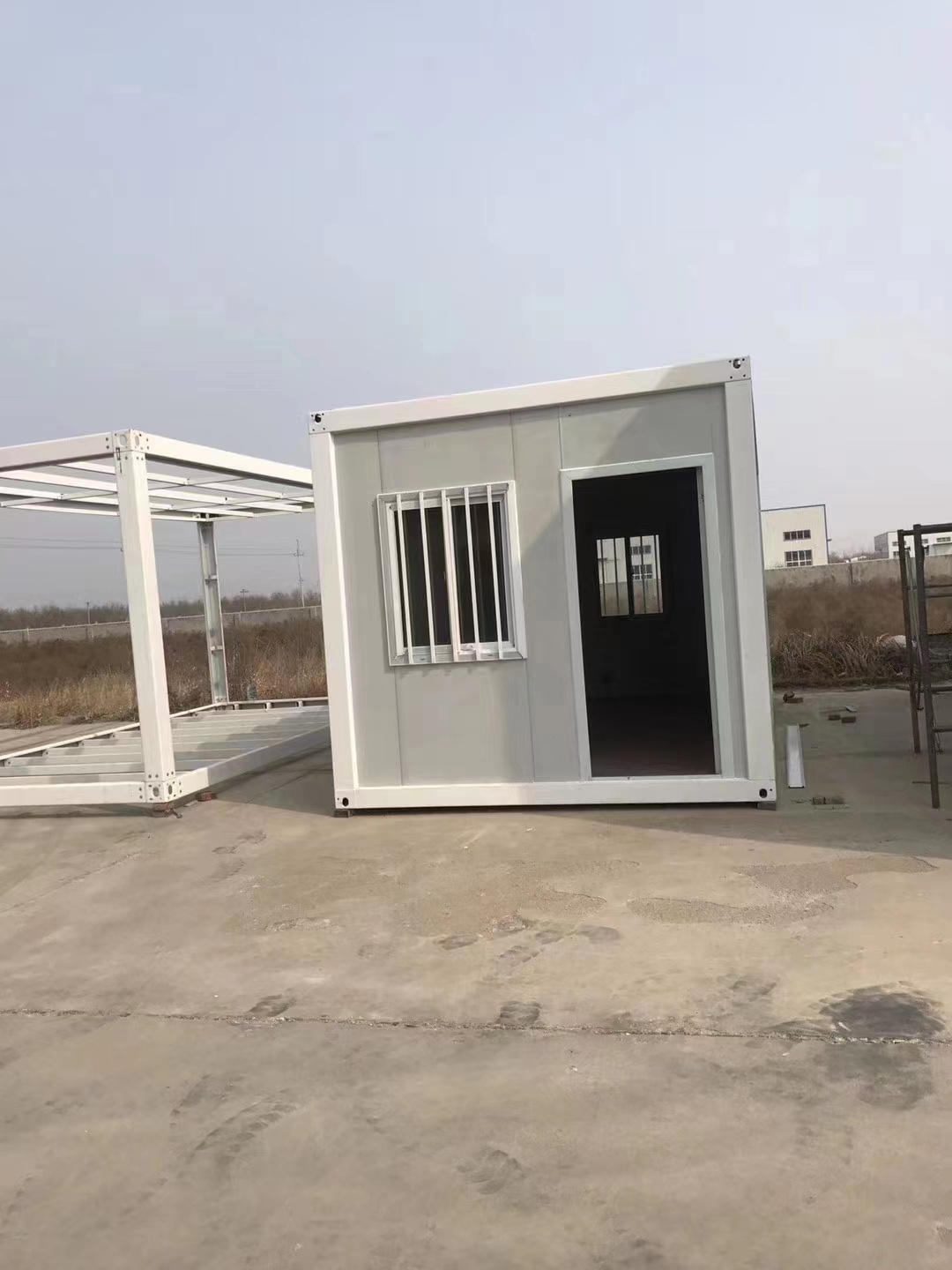 Mini cheapest solar powered portable collapsible steel frame prefabricated mobile house living tiny cabin homes for sale