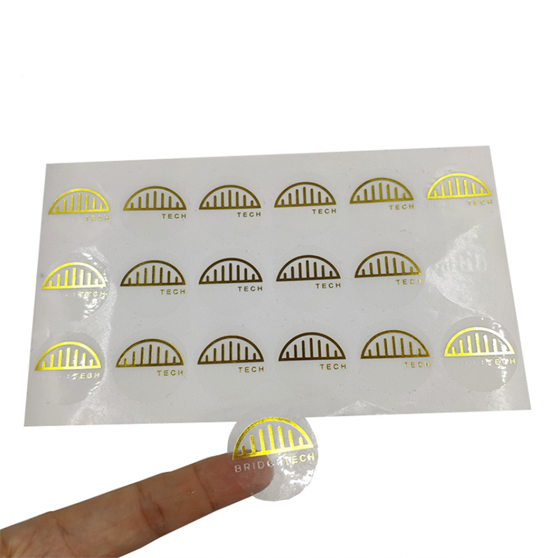 ODM gold foil clear logo stickers self adhesive transparent private waterproof packaging vinyl labels