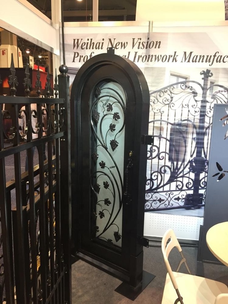 Arched top wrought iron single swing doors iron exterior entrance doors wine cellar doors