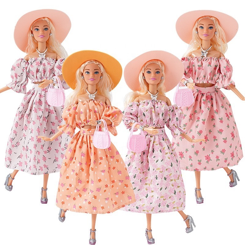 Pink movie 30CM doll 11 inches European and American autumn fashion floral dress hat travel baby clothes