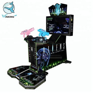 Winking Coin operated simulator arcade gun shooting Aliens extermination video game machine