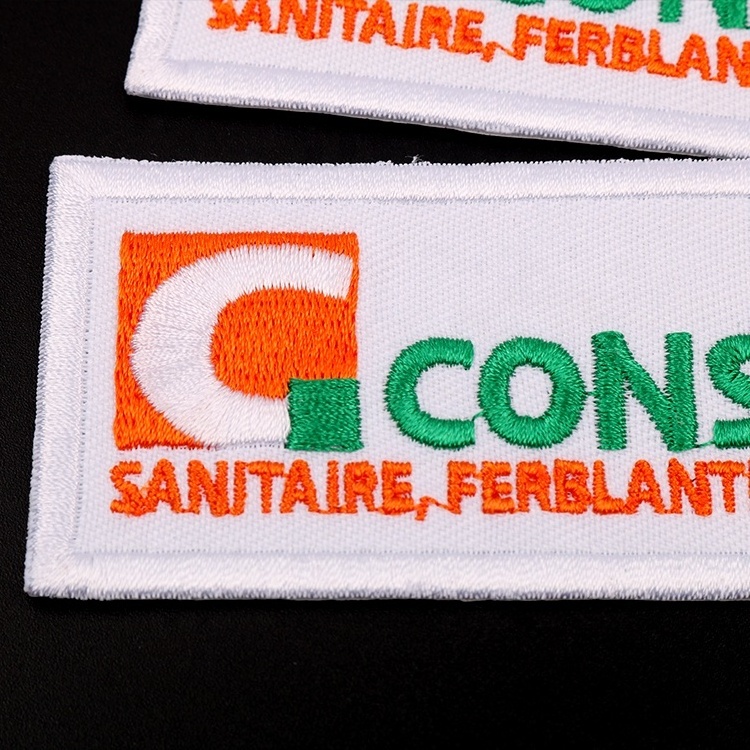 Top Quality Appliques Customized Name Logo Clothing Twill Embroidered Patches with Adhesive Glue Backed