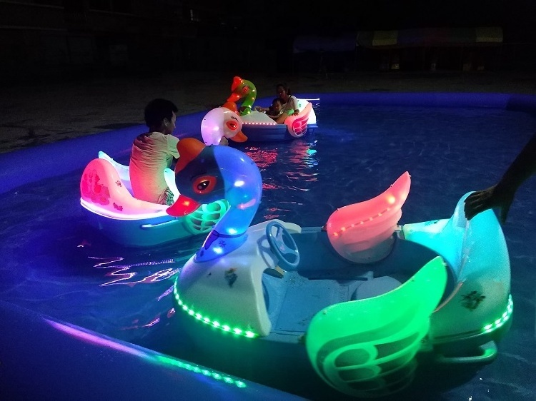 Top rated Amusement park plastic water bumper boats, electric boat with LED light, inflatable pool hand ship hot sale