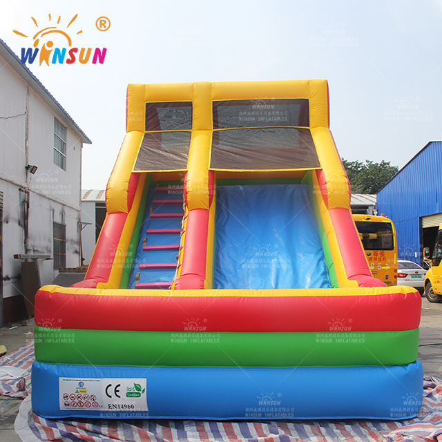 Commercial inflatable double lane slip slide large red blue slide with climbing rock outdoor slide for kids adults