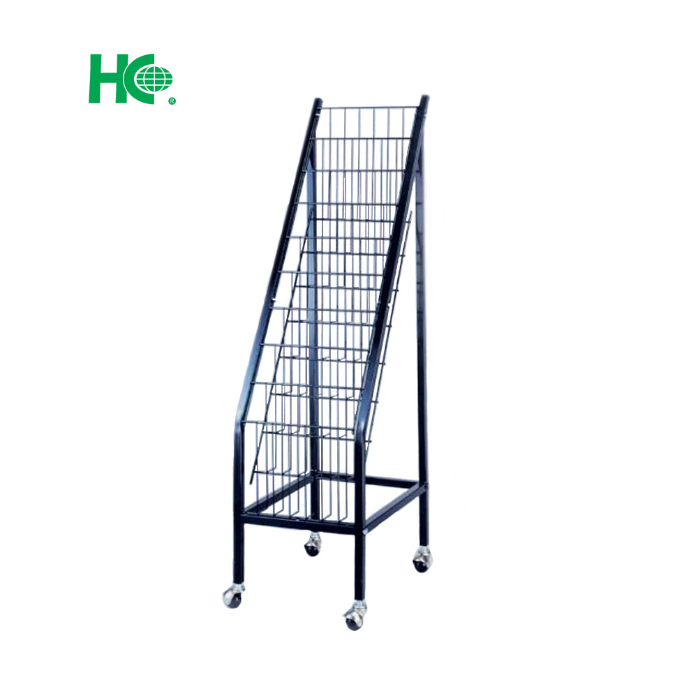 Floor standing metal magazine rack stand with wheels