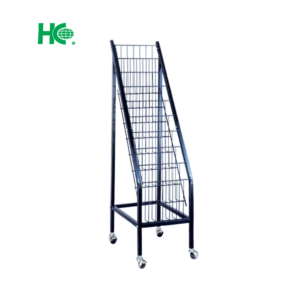 Floor standing metal magazine rack stand with wheels