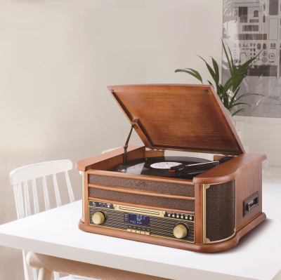 Old fashion operated turntable phonograph music box gramophone with cassette player