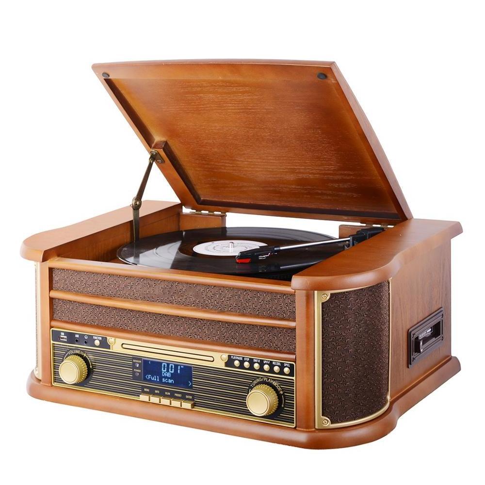 Old fashion operated turntable phonograph music box gramophone with cassette player