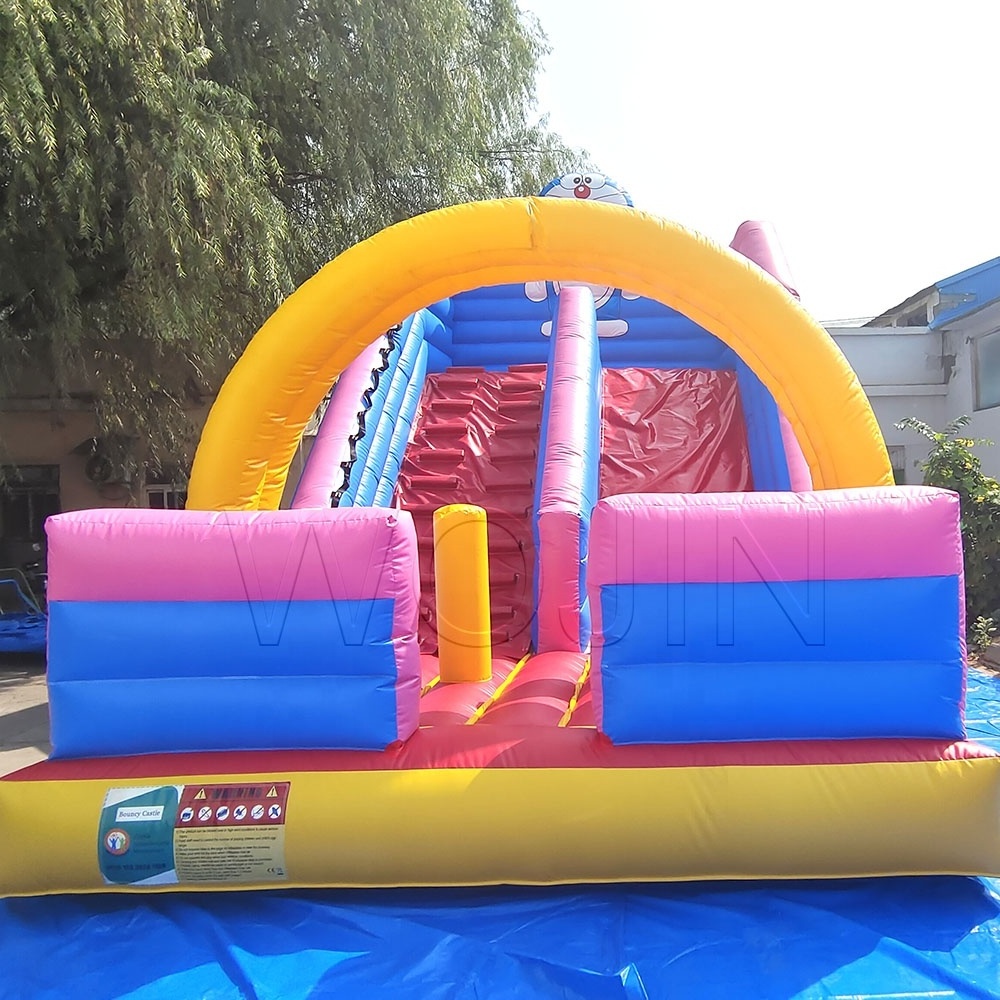 Doraemon New design inflatable dry slide inflatable bouncy castle ground slide for kids outdoor playing