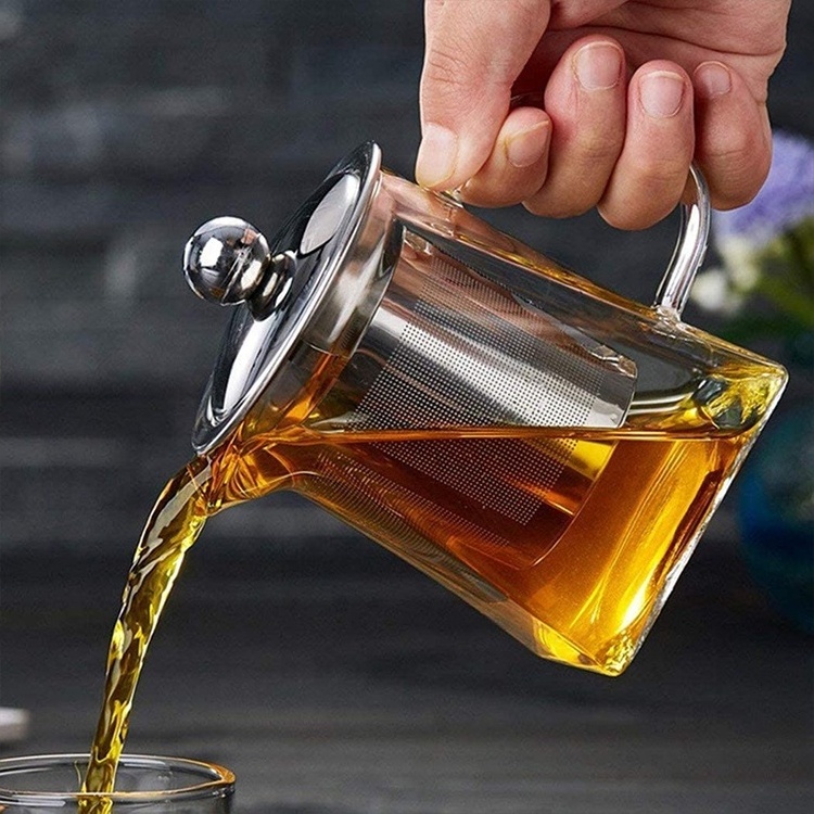 Top Seller 950ml clear tea cup pot set high borosilicate teapot glass tea pot with infuser handle suitable for stovetop