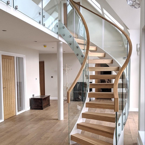 Modern stair case curved solid wood stairs with glass curved stair rail