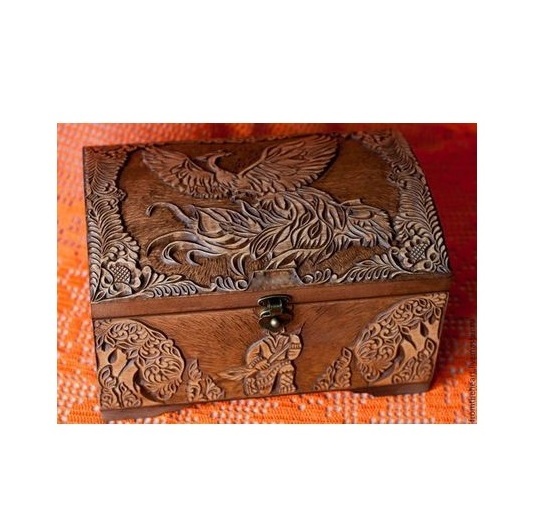 Attractive rectangular wooden trinket box decorated with a hand carved intricate floral bird design