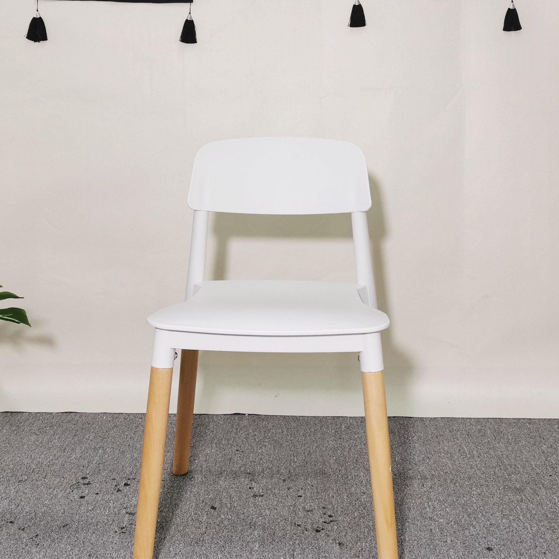 Wholesale Price Home Furniture Black PP Seat Wooden Leg Cheap Plastic Stacking Chairs for Restaurant