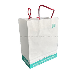 Wholesale white paper bags with customized logo printed for gift makeup product shopping packaging with handle for Valentine