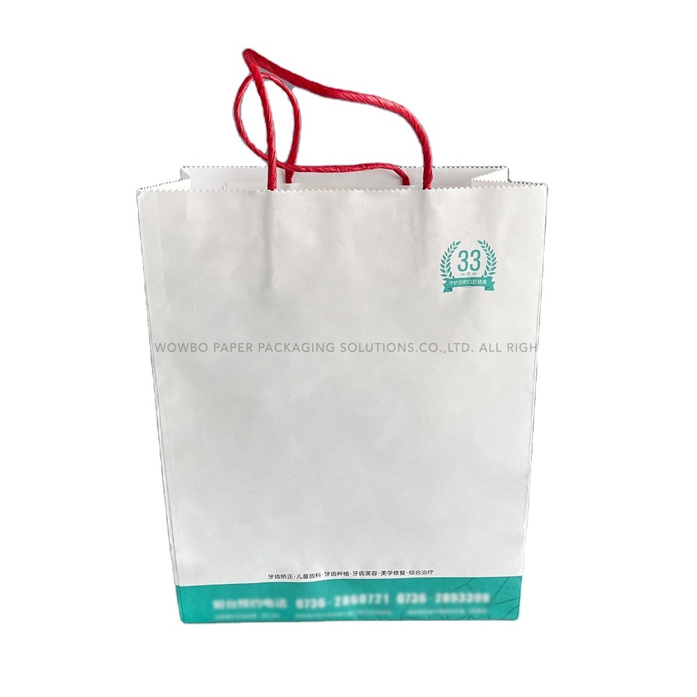 Wholesale white paper bags with customized logo printed for gift makeup product shopping packaging with handle for Valentine