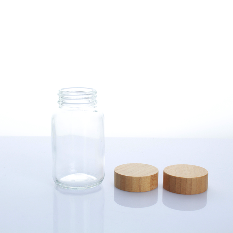 Hot Sell 150ml 200ml  bamboo top  frosted clear  cosmetic 5 oz tablet empty glass bottle with screw lid for supplement