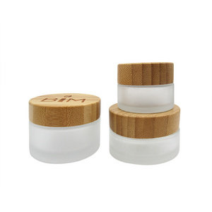 Luxury custom Cosmetic packaging 5ml 10ml 20ml 50ml 100ml Empty Clear frosted glass face Cream jar with bamboo lids