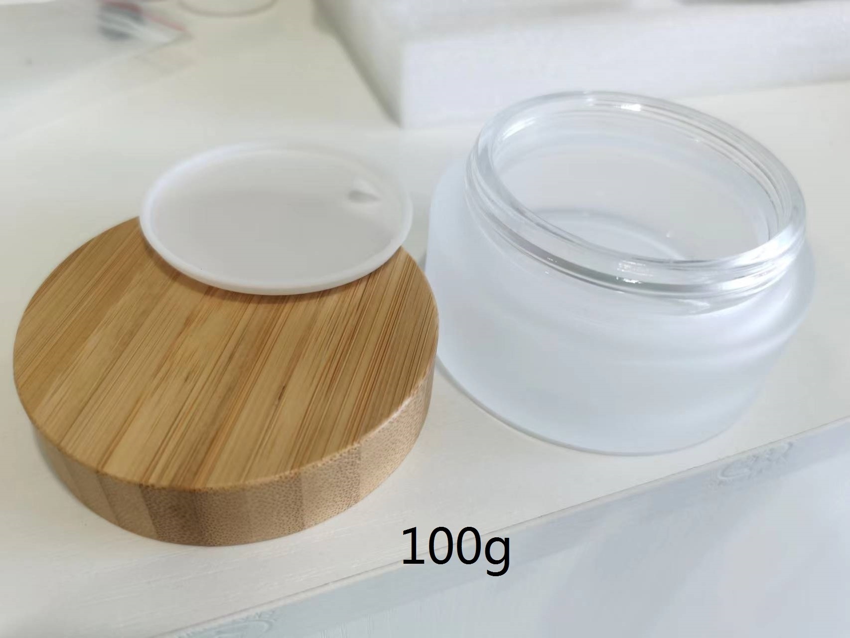 Luxury custom Cosmetic packaging 5ml 10ml 20ml 50ml 100ml Empty Clear frosted glass face Cream jar with bamboo lids