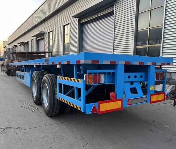 Wosheng hot selling China factory 2/3 axles  Flatbed Semi Trailer 20FT 40FT  Flat Bed Container Semi truck trailers