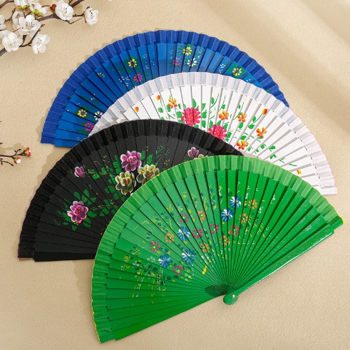 manufacturer wholesale 7-inch Spanish double-sided hand-painted wooden retro hand-painted fan gift folding wooden bone fan