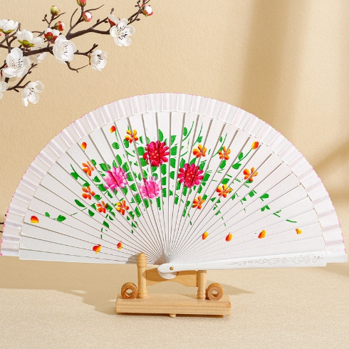 manufacturer wholesale 7-inch Spanish double-sided hand-painted wooden retro hand-painted fan gift folding wooden bone fan