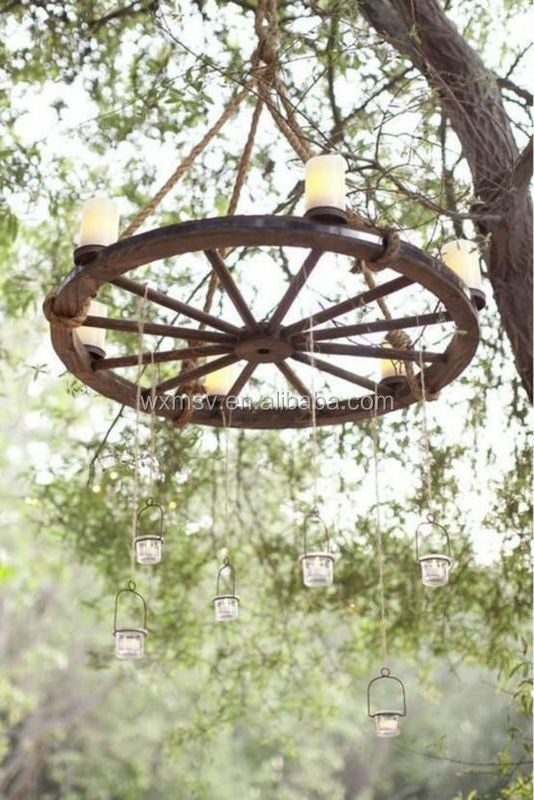 Use antique wooden wagon wheel to make a light