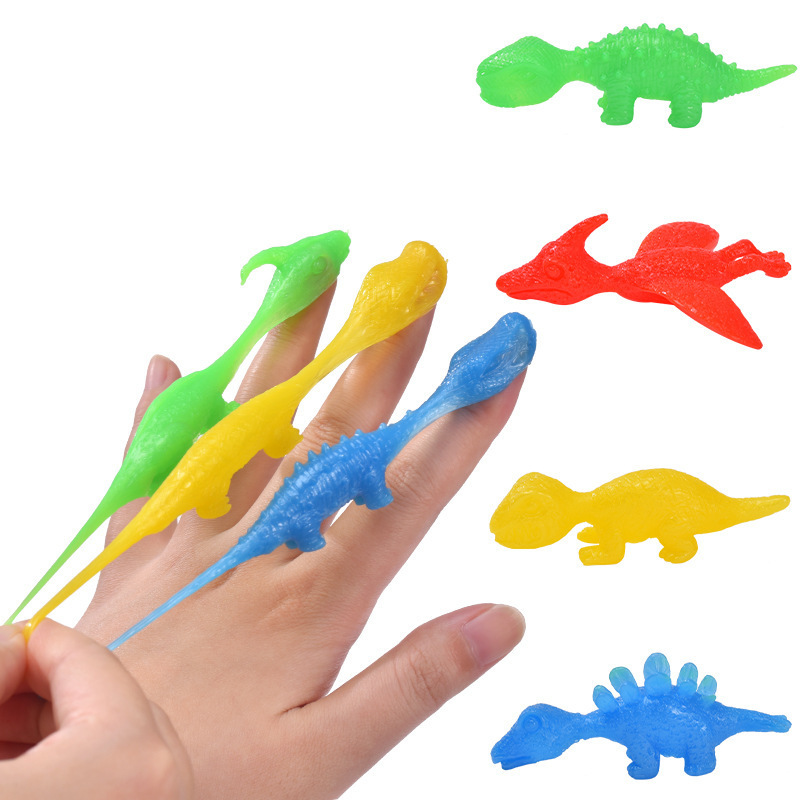 2024 Hot selling New Mini Funny Playful Catapult Flying Squeeze Dino sling shot dino TPR Slingshot Dinosaur Toy