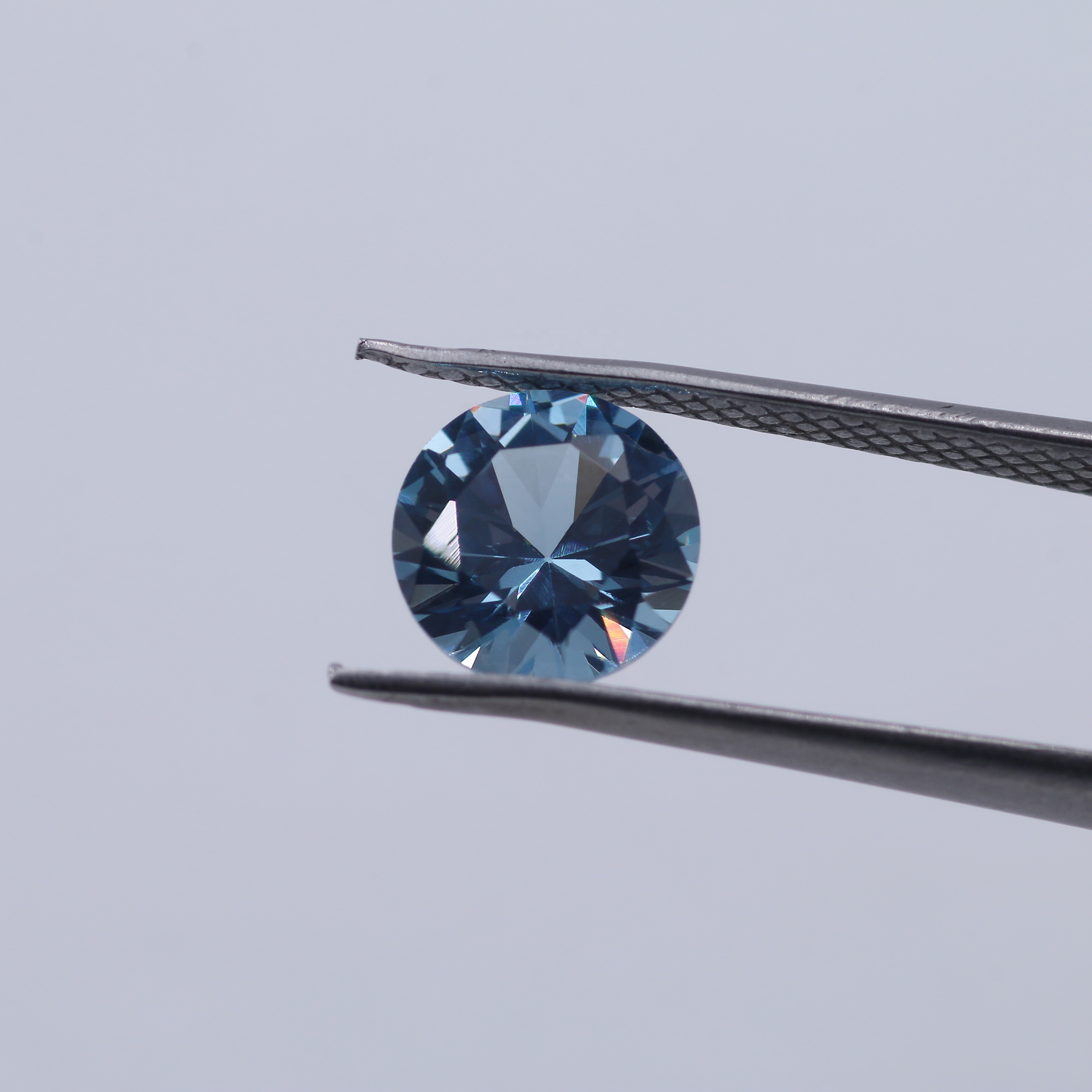 Wholesale Loose Gemstone 106# Round  Aquamarine Synthetic Spinel Price Per Carat