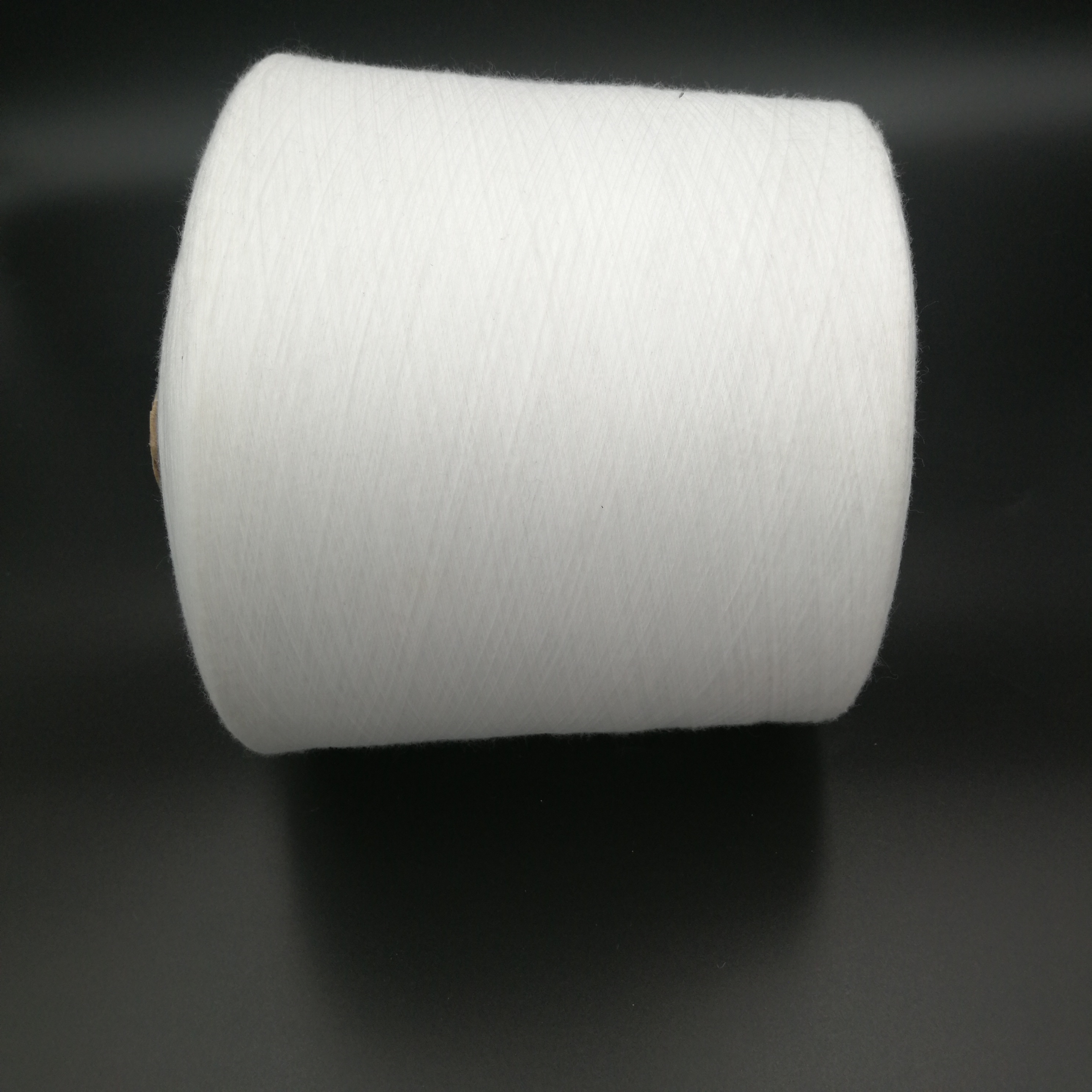 100% Virgin polyester yarn polyester spun yarn raw white in China use for knitting and weaving 10S,16S,21S,32S