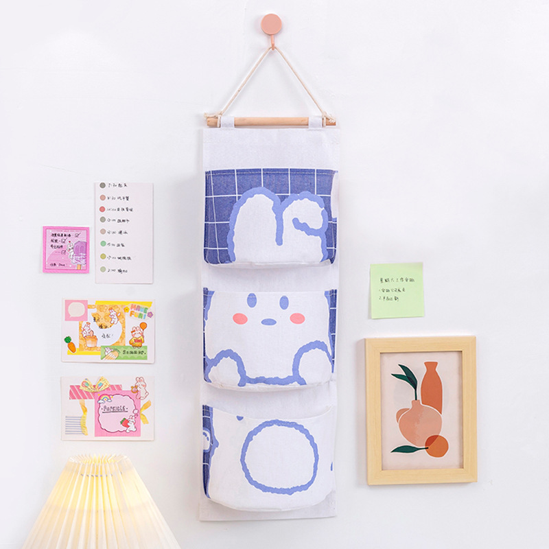 New creative cotton, linen and cloth art storage triple hanging bag sundries behind the door three-layer hanging bag storage bag