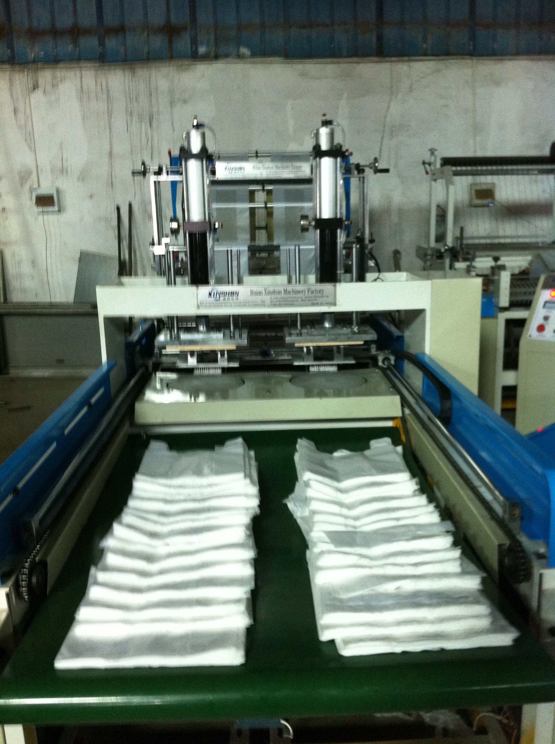 ruian xinshun poly bag making machine,plastic carry bag making machine,poly bag making machine price