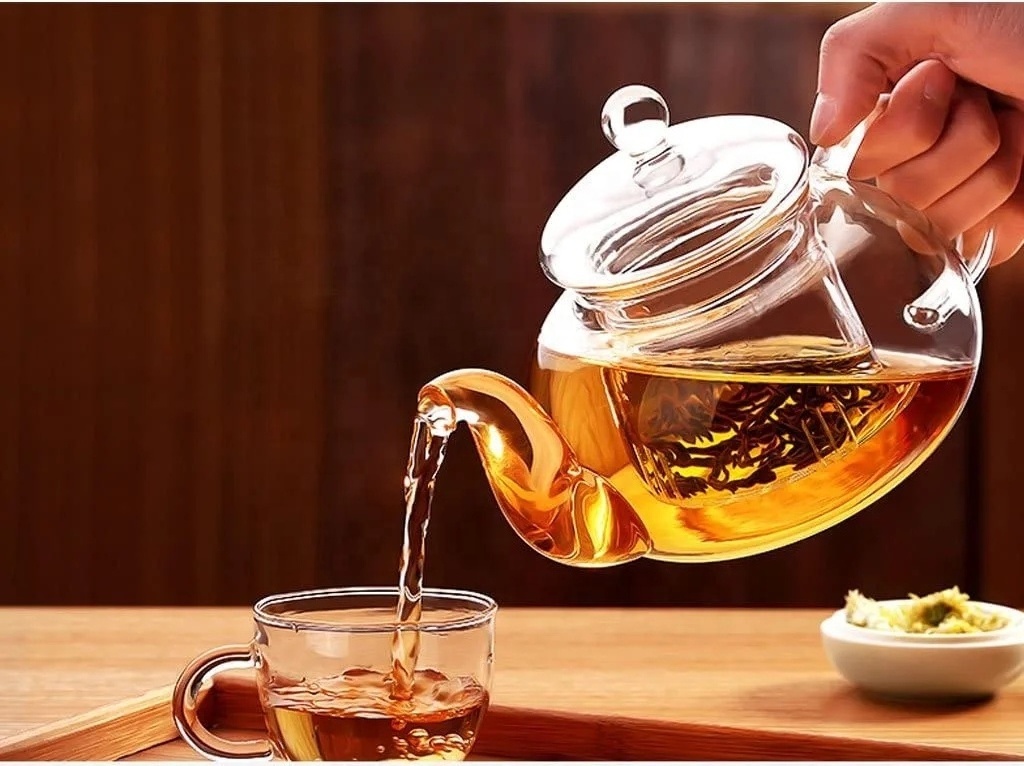 High Quality  Hot Sale Heat Tempered Clear Glass Tea Pot Blooming Glass Flower Teapot With Infuser Loose Leaf Tea Pots Maker