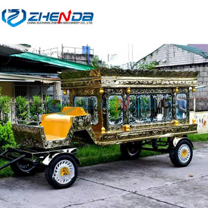 Golden funeral carriage Traditional funeral hearse. Luxury horse drawn hearse