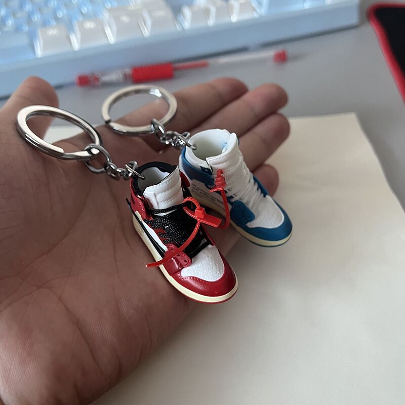 Xinxing Wholesale Fashion 3d Mini  Shoes Designs Rubber Keychain With Box And Bag Pendant  Llavero de zapatillas Keyring Sneaker