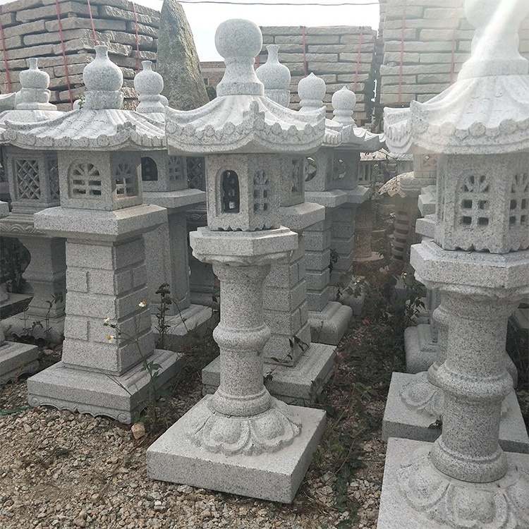 Natural japanese garden stone and cast iron lantern for outdoor