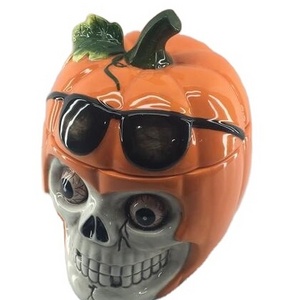 Wholesale Latest design ceramic halloween pumpkin Skull Cookie jar for holiday decoration