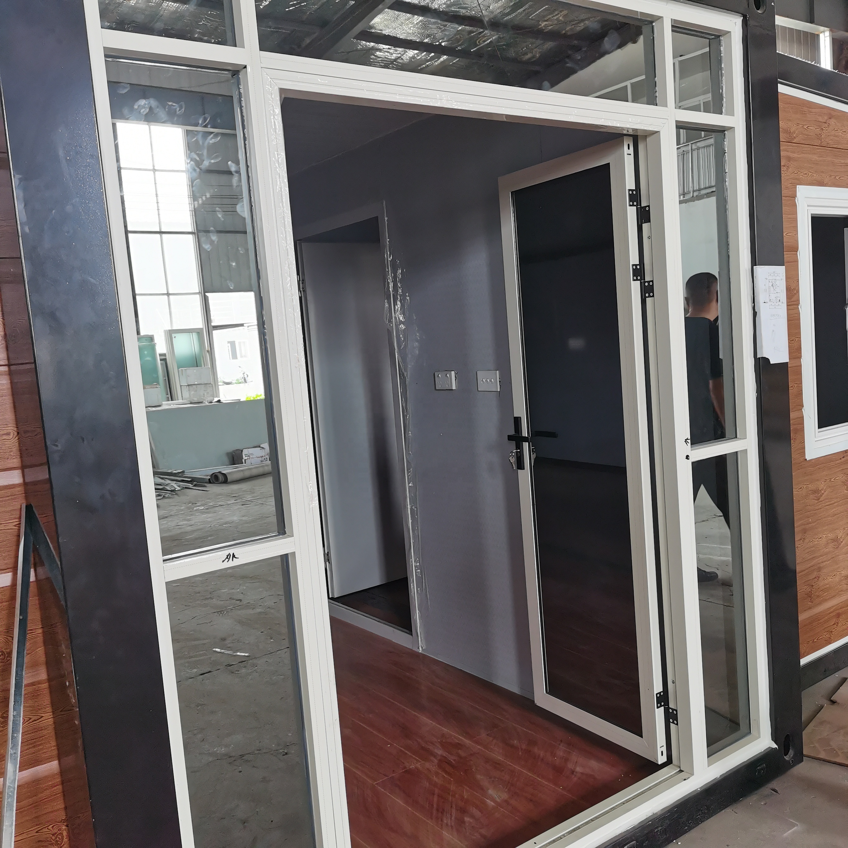 New new technology container office steel structure frame welded flat pack container house as dormitory