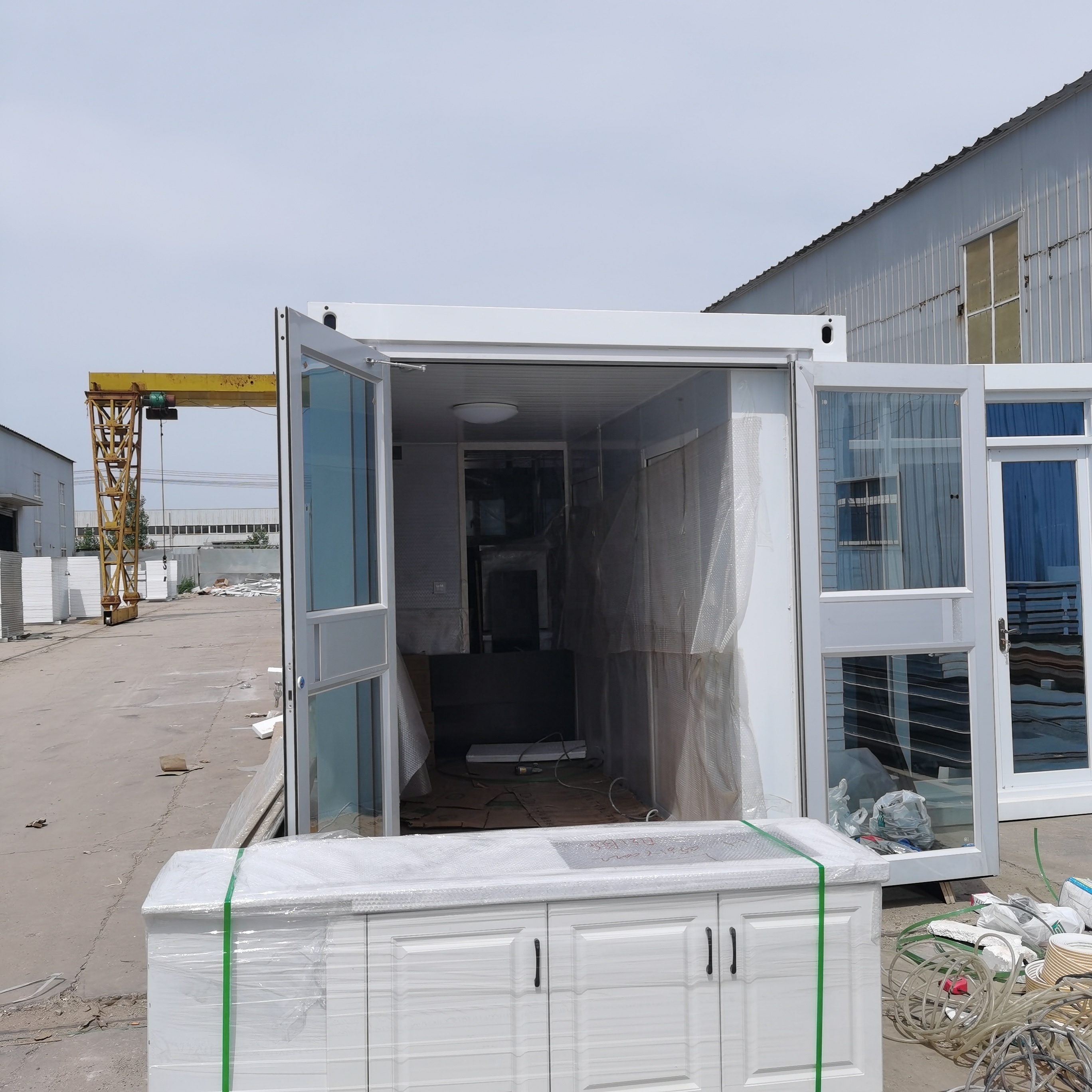 New new technology container office steel structure frame welded flat pack container house as dormitory