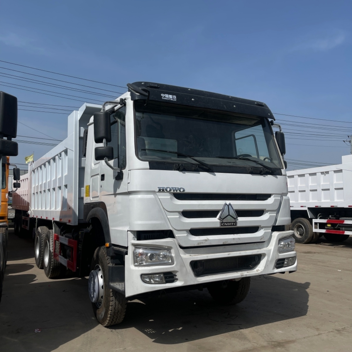 Low cab New / Used Dump Truck Sinotruk Howo Volquetes 6x4 30 Ton 10 Wheeler Tipper Truck 375 Dump Truck Used