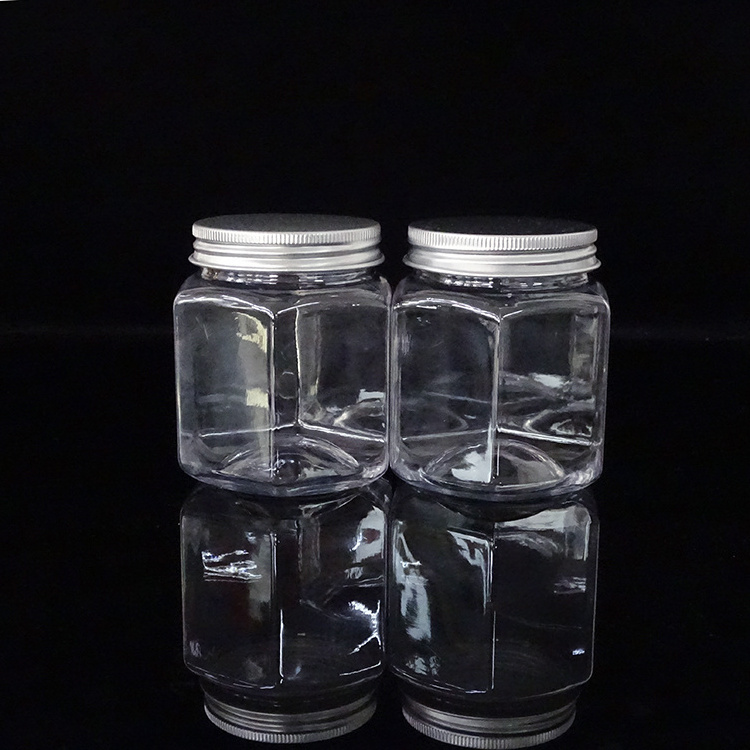 Empty food grade clear PET plastic hexagon jars for honey packaging