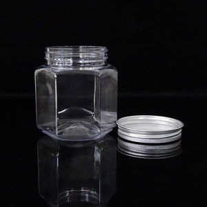 Empty food grade clear PET plastic hexagon jars for honey packaging