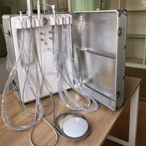 Portable dental unit/instrument/equipment with air compressor, ultrasonic scaler, led curing light and other dental accessories