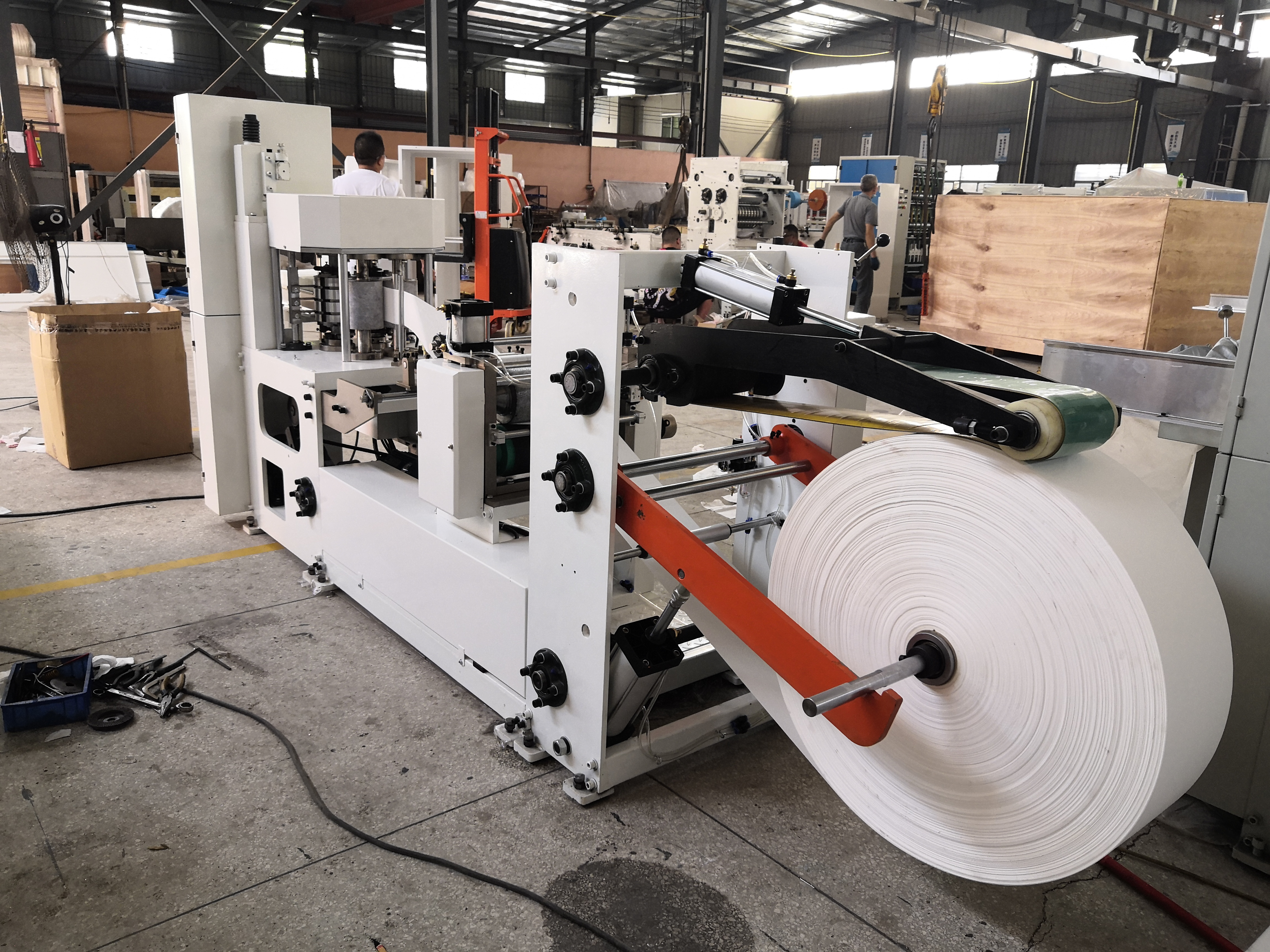 China supply low cost paper napkin automatic folding making machine