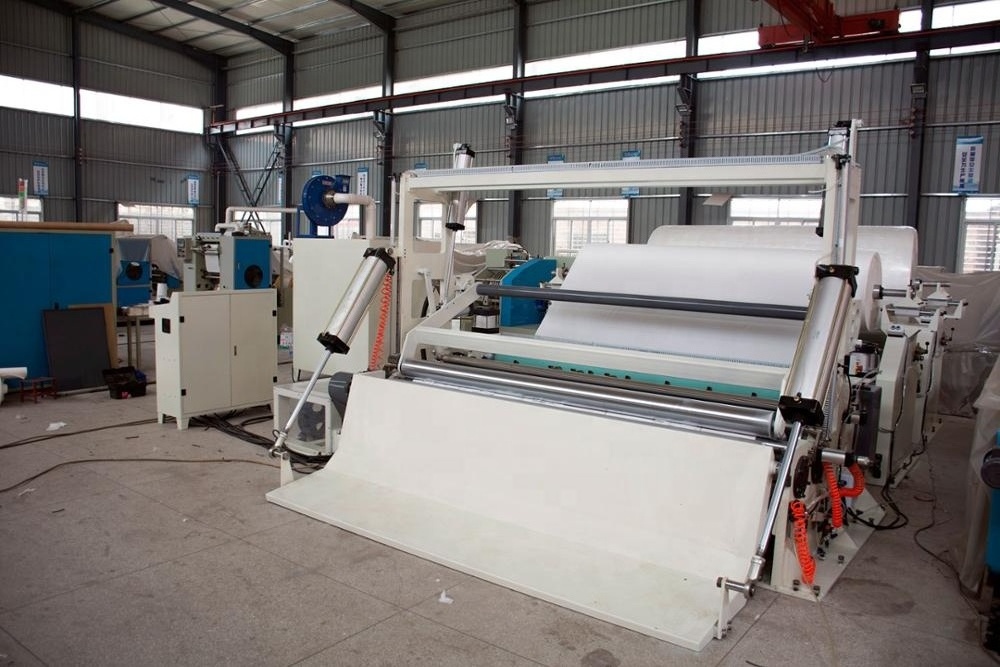 Jumbo paper roll cutter raw material tissue slitting rewinding machine price