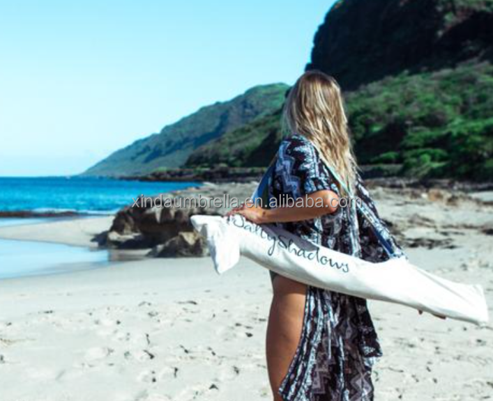 round luxury beach umbrella with tassels