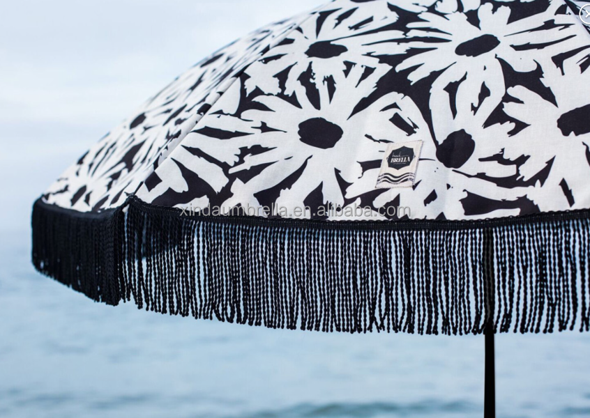 round luxury beach umbrella with tassels