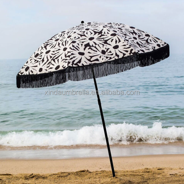 round luxury beach umbrella with tassels