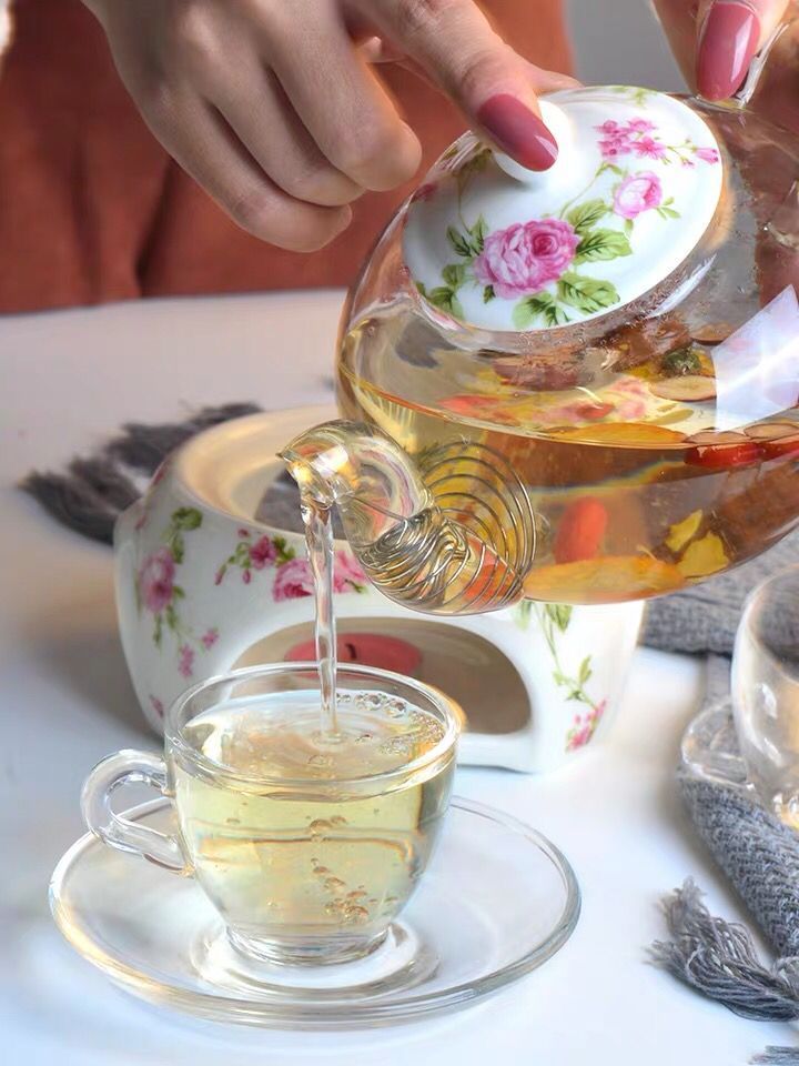 clear heat-resistant 600ml glass teapot with ceramics warmer and infuser