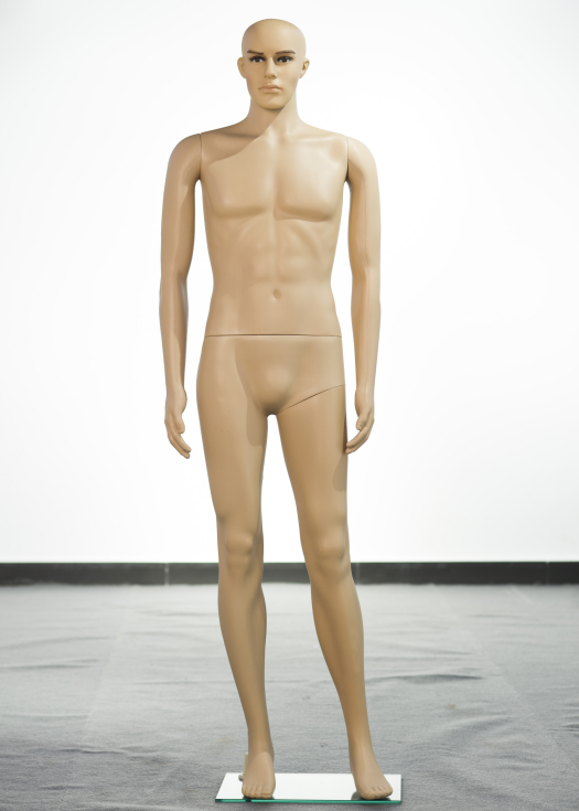 plastic man mannequin in skin color with lifelike head