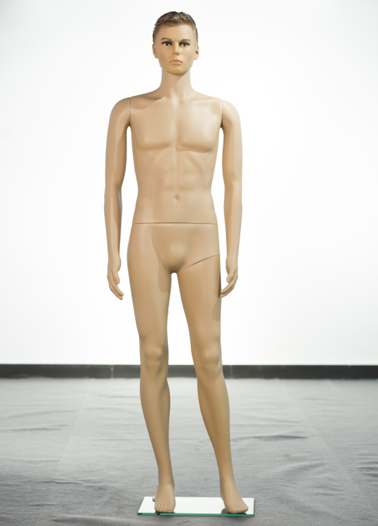 plastic man mannequin in skin color with lifelike head